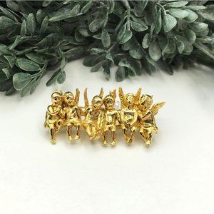 Vintage brooch cherubs sitting in a row gold tone by Edgar Berebi